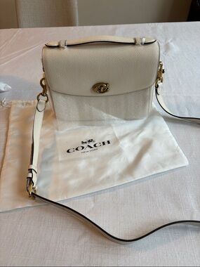 Coach Pebbled Leather Turnlock Crossbody in Chalk